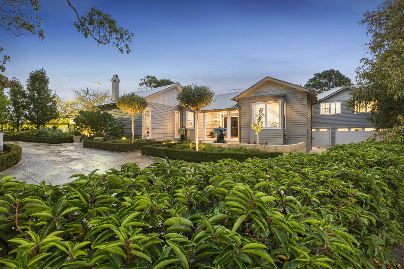 Custom home built into a Mornington Peninsula site at dusk